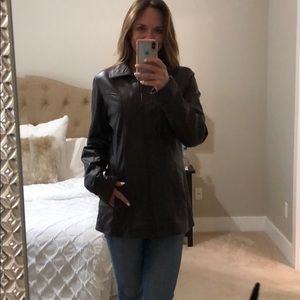 Leather coat.  Made for taller ladies.